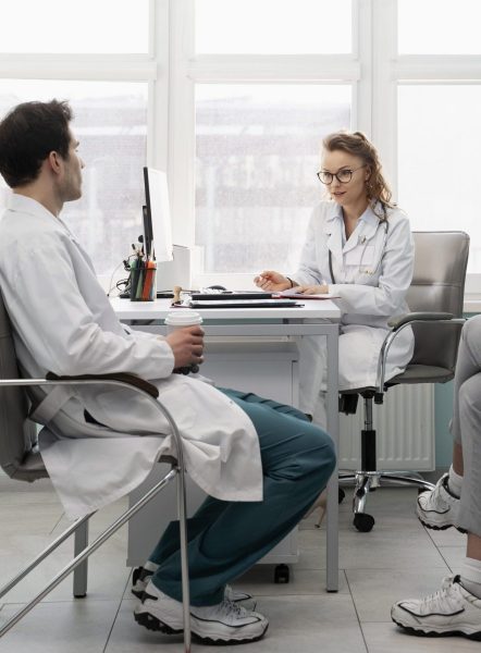 doctors-discussing-work-with-coffee-cups-min